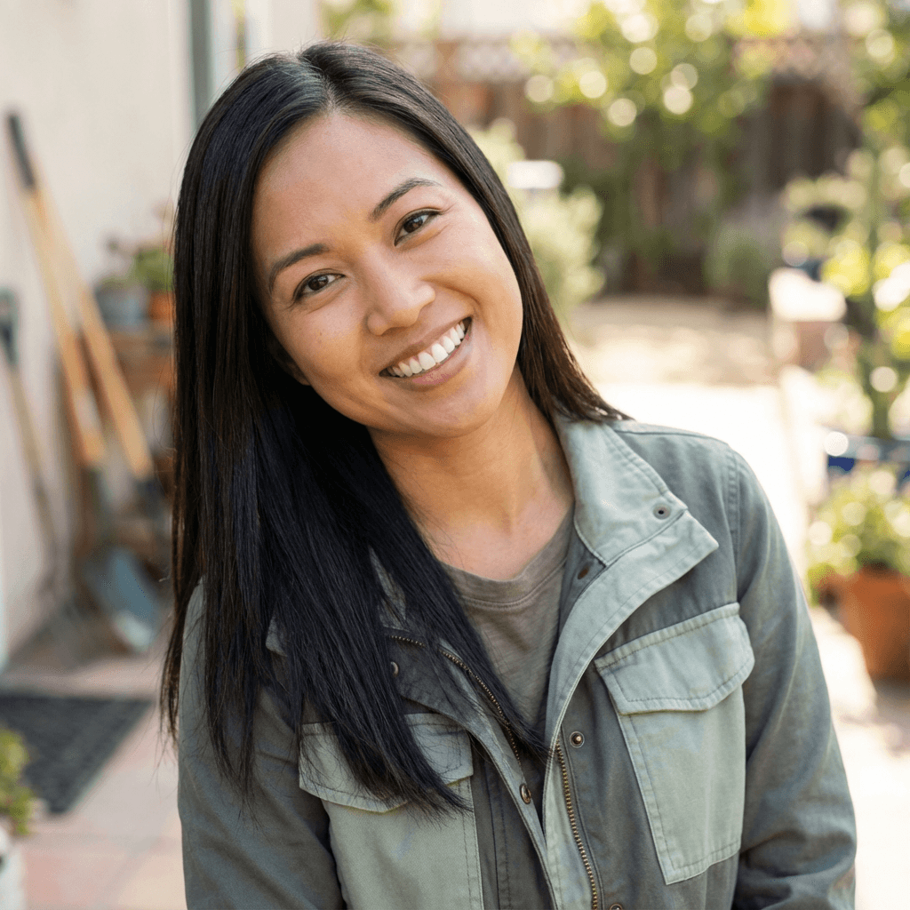 Female homeowner in mid 30s, Middle Eastern, welcoming expression, casual smart attire